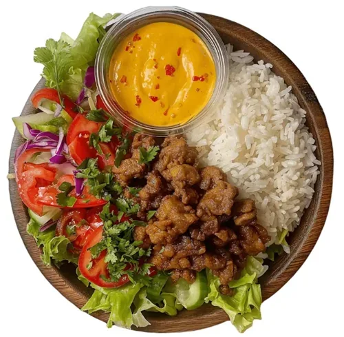 Mexican Chicken — Fragrant lemon rice topped with sautéed chicken, mixed veggies, salad, and spicy mayo