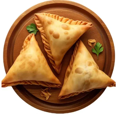 Wicked Samosas — Large vegetable samosas, served with tamarind sauce on the side
